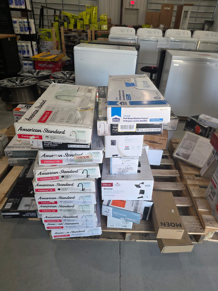Boxes of bathroom fixtures on a pallet