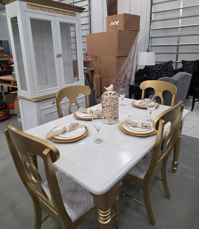 Kitchen-table-and-dining-set A dining room set with a table, chairs & cabinet